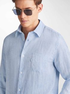 The Monaco shirt features a curved back yoke with a box-pleat for comfort and a curved hem with side vents for ease of movement. We've used the classic styling of a button-through front and cuffs, a 2-piece collar and for a modern addition, we've added a U-shaped breast pocket with a handy sunglass loop for effortless summer chic. For a final touch of luxe, the shirt is finished with mother of pearl buttons throughout and our minimalist rose logo label at the hem. There's also a handy 'locker' l Minimalist Rose, Rose Logo, Modern Addition, Curved Back, Summer Chic, Logo Label, Final Touch, Box Pleats, Italian Fabric