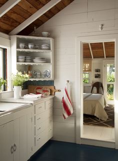 the kitchen is clean and ready to be used as a dining room or bedroom area