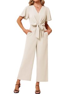 PRICES MAY VARY. 【COMFY FABRIC】Made of 65% Polyester, 26% Viscose, 9% Elastane, this elegant summer jumpsuit is soft, comfy and provides all-day comfort. S=US 4-6, M=US 8-10, L=US 12-14, XL=US 16, XXL=US 18. Please refer to the size chart with care. 【FEATURES】V Neck, Unique Front Design, Elastic Waist,Two Side Pockets, Hidden Zipper at Back. The classic wrap v neck jumpsuit showcases your delicate collarbone, stylish yet sophisticated. These rompers have self-tie bow-knots on their front waist, Rehearsal Dinner Romper, Resort Business Casual Outfits, 50th High School Reunion Outfit, Modest Pant, Anniversary Party Outfit Guest, Fall Rehearsal Dinner Outfit, Casual Rehearsal Dinner Outfit, Rehearsal Dinner Outfit For Guest, Wedding Shower Outfit For Guest