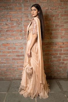 Beige pre-draped saree in a solid base with tiered layers and side drape. Comes with padded blouse embellished with 3D floral sequin and beads. - Aza Fashions Draped Saree, Padded Blouse, Drape Saree, Embellished Blouse, Beaded Neckline, Blouse For Women, Saree With Blouse, Aza Fashion, Types Of Sleeves