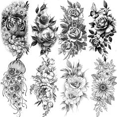 a bunch of flowers that are on top of a white sheet with some writing in it