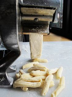 peeled bananas are being processed in a machine