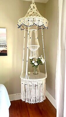 The overall look is intricate and delicate, yet sturdy. to ensure perfect, glass-look. An absolute beauty! Ceiling to upper plant holder: 43". Ceiling to tabletop: 70". Overall 90" Long. Macrame Shelves, Macrame Furniture, Vintage Macrame Patterns, Macrame Shelf, Macrame Table, Fairy Pictures, Boho Macrame, Macrame Hanging, Diy Decorations