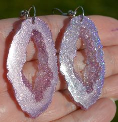 "Beautiful Lavender Pink Hologram Earrings These Faux Geode Earrings Are a Little Bit Transparent-Depending How The Light Hits them. They Are So Pretty! My Photos Do Not Do Them Justice Such a Rainbow When The Light Hits! Earrings Measure About 1 3/4\" x 7/8\" Nice Lightweight Earrings Choose Goldtone or Silvertone Wires at Check Out. Gold Not Pictured Nickle Free Wires Your Earrings Will Arrive In an Organza Bag -Ready For Gift Giving. Made From Epoxy Resin" Lavender Hypoallergenic Drop Earrings, Purple Pierced Crystal Earrings As Gift, Purple Resin Earrings Perfect For Gifts, Purple Resin Earrings As A Gift, Purple Resin Earrings For Gift, Purple Resin Earrings As Gift, Purple Resin Jewelry With Matching Earrings, Purple Resin Jewelry For Party, Purple Resin Party Jewelry