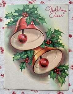 an old fashioned christmas card with bells and holly