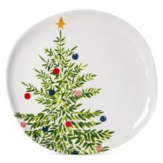 a white plate with a christmas tree painted on it