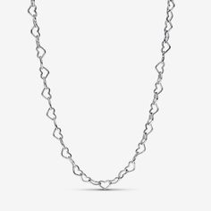 Go for delicate elegance when you choose the Linked Hearts Collier Necklace. Tiny sterling silver linked hearts form an adjustable chain necklace. This design takes a classic shape and reinvents it in the form of a scaled-down, repeat pattern. Equal parts sweet and sophisticated, this sleek sterling silver heart necklace will become a core component of any jewelry collection. Wear with a maximum of 1-2 charms/dangle charms. - Pandora Linked Hearts Collier Necklace - Sterling silver - Sz. 17.7 in Cheap Silver Chain Necklace With Heart Charm, Sterling Silver Heart Chain Necklace For Anniversary, Silver Double Heart Necklace Tarnish Resistant, Silver Cable Chain Jewelry For Valentine's Day, Valentine's Day Silver Jewelry With Cable Chain, Valentine's Day Silver Chain Necklace, Valentine's Day Silver Cable Chain Jewelry, Affordable Heart-shaped Silver Chain Necklace, Heart-shaped Sterling Silver Chain Necklace