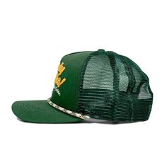 a green hat with yellow letters on the front, and a chain around the brim