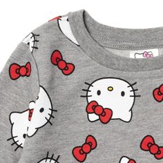 Your Hello Kitty fan is ready for a fun day with her favorite kawaii cartoon character. Perfect for chilly days, this warm pullover sweatshirt features a pretty all-over print of red bows and Hello Kitty's adorable cat face. Made of a soft material that keeps your little girl comfortable, this stylish Hello Kitty sweatshirt is part of the perfect cute and cozy winter outfit. Winter Essentials Clothes, Cozy Winter Outfit, Shop Hello Kitty, Comfy Sweatshirts, Hello Kitty Sweatshirt, List Of Characters, Friends Season, Cozy Winter Outfits, Comfy Sweatshirt