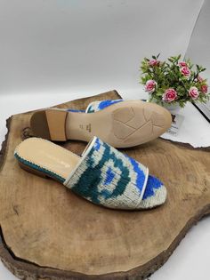 Handmade genuine leather women's slip on. Made with handwoven velvet ikat, natural leather and leather soled. Every size available. İf you like to have other colour please send us messages. Handmade. Very comfy and useful. Made in Turkey. We have door to door express shipping service. İf you have any questions please contact with us. bemyboots.etsy.com Thank You Handmade Casual Slip-on Sandals, Artisan Handmade Slip-on Mules, Artisan Handmade Slip-on Slippers, Handmade Artisan Slip-on Slippers, Artisan Slip-on Sandals For Vacation, Natural Handwoven Slip-on Sandals, Traditional Handwoven Slip-on Sandals, Casual Handwoven Closed Toe Sandals, Casual Handwoven Slip-on Sandals