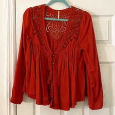 Free People Embellished Cutout Top Color: Rust Orange Size: S New Without Tags. Never Worn. I Have The Extra Beads For It As Well. Could Be Worn With A Cami Or Bralette Underneath Or Unbutton For A Jacket Look. Bohemian Embellished Tops For Fall, Cutout Top, Cut Out Top, Rust Orange, Free People Tops, Color Orange, Fall Fashion, Bralette, Rust