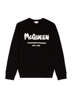 Find ALEXANDER MCQUEEN Graffiti Print Sweatshirt In Black on Editorialist. Alexander McQueen Graffiti Print Sweatshirt in Black 95% cotton 5% elastane. Made in Italy. Machine wash. Front logo print. French terry fabric. AMCQ-MK33. 688713QSZ81. About the designer: Always the king of controversy, Alexander McQueen was known for runways exotic in clothing, models, and set decor. At a young age, McQueen cut his teeth on Savile Row, where he apprenticed with tailors Anderson & Sheppard and worked for Anderson Sheppard, Isabella Blow, Daphne Guinness, Career Fashion, Set Decor, Graffiti Prints, Savile Row, French Terry Fabric, Print Sweatshirt