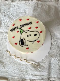 a birthday cake with a dog on it