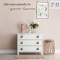 a white dresser sitting in front of a pink wall with a quote above it that says, add some panache to your home