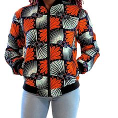 Colorful Stunning African print Unisex Bomber Jacket elevates any outfit making it stand out. You can wear it during the cold days like Spring or Autumn .  style it with jeans/ other plain pants  or up trend the bomber by leaving the jeans behind and going for a cool, clean casual look. Handmade with 100% cotton African Print fabric yarn, fully lined, one inside pocket, two twin pockets on the side, front zip and Elastic trimings Available in two sizes, Small/Medium fits both small and medium si Casual Long Sleeve Printed Outerwear, Printed Long Sleeve Outerwear For Fall, Casual Fitted Windbreaker With Pockets, Fitted Casual Windbreaker With Pockets, Casual Cotton Printed Outerwear, Casual Printed Cotton Outerwear, Printed Cotton Outerwear For Fall, Printed Cotton Fall Outerwear, Fitted Printed Outerwear For Fall