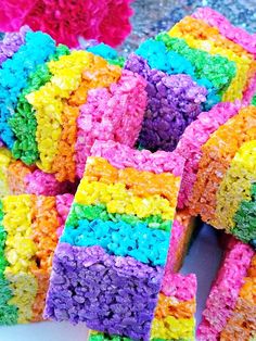 colorful rice krispy treats stacked on top of each other