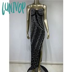 45221415977211|45221416009979|45221416042747|45221416075515 Black Embellished Sleeveless Evening Dress, Sequin Spaghetti Strap Maxi Dress For Parties, Black Spaghetti Strap Maxi Dress For Party, Black Maxi Dress With Spaghetti Straps For Party, Glamorous Black Evening Dress For Summer, Glamorous Black Summer Evening Dress, Black Sleeveless Evening Dress With Rhinestones, Glamorous Black Evening Dress With Spaghetti Straps, Sleeveless Black Sequined Evening Dress