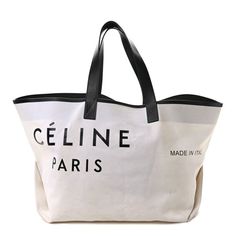 This is an authentic CELINE Textile Medium Made In Tote in White and Black. This stylish tote is beautifully crafted of white fabric with Celine Paris imprinted on the front in black. This tote features black matte leather trim and tall flat black leather shoulder straps making this baga beautifully simple design. The top is open to a white interior with a matching companion pouch. This is a excellent tote for everyday use, from Celine! Designer Shoulder Bag With Logo Print, Luxury Shoulder Bag With Logo Print For Travel, Luxury Logo Print Shoulder Bag For Travel, Designer Black Bag With Logo Print, Luxury White Bag With Logo Print, Luxury Rectangular Bag With Logo Print, Luxury Rectangular Bags With Logo Print, Luxury Rectangular Shoulder Bag With Logo Print, Designer Leather Bag With Logo Print