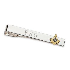 This polished, silver-tone tie bar is accented with a 23K electroplated gold Masonic emblem.2¼ x ¼"Clip closureEngraved free of chargeFeatures: EngraveableJewelry Closure: ClipMetal Color: Silver ToneBase Material: 100% BrassCare: Wipe CleanMetal: BrassCountry of Origin: Made in US Silver Nameplate Jewelry For Formal Occasion, Modern Silver Suit And Tie Accessories For Business, Classic Engraved Jewelry For Business, Classic Personalized Jewelry For Business, Classic Silver Lapel Pin For Business, Classic Silver Lapel Pin For Anniversary, Personalized Adjustable Jewelry For Business, Adjustable Personalized Jewelry For Business, Formal Engraved Jewelry For Father's Day