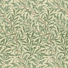 a green and white wallpaper with leaves on it