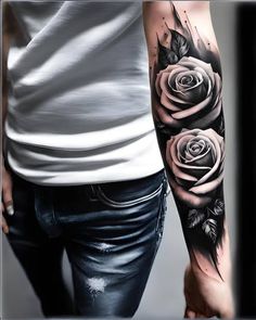 black and white roses tattoo on the arm