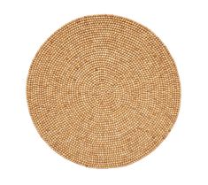 a round woven placemat on a white background