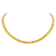 The yellow sapphire riviera choker features perfectly calibrated and homogeneous faceted round yellow sapphires of fiery color and crystalline texture for a total of 44.88 carats. The gold work is exquisitely articulated with a proper balance between structure and flexibility. The necklace is 15.5 inches long and lays beautifully on the neck. It is one-of-a-kind. It was handmade in Italy in our own workshop by maestro Scalabrì in 18 carat white gold according to an original design by Ella Gafter Choker Necklace Designs, Necklace Design, Gold Work, Yellow Sapphire, Necklace Designs, Original Design, Original Designs, Choker, Choker Necklace