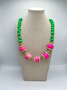 A beautiful kelly green beaded necklace with HOT pink accent beads for a statement!! Pink Statement Necklace, Green Beaded Necklace, Pink Accents, Chic Boutique, Holiday Specials, Kelly Green, Hot Pink, Statement Necklace, Beaded Necklace