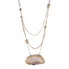 Pre-owned Chanel multi-strand necklace crafted in champagne-hued yellow tone (circa 2012).    The necklace has multiple strands embellished with sparkling crystals, terminating with a large piece of agate at the base (measures 3 1/2 x 2 inches). Measuring 35 inches in length the necklace is slightly adjustable to 34 inches. The stones are in very good condition (no chips or flaking). Dating to the 2012 autumn collection the necklace makes a great statement with soft hues of lilac and shimmering crystals.    The necklace is in very good condition showing minimal wear.    Particulars:    Weight: 119.1 grams    Size & Measurements: The necklace measures 35 inches in length and is slightly adjustable to 34 inches. The agate measures 3 1/2 x 2 inches.    Metal & Hallmark: Light yellow-gold tone Elegant Long Agate Necklace, Yellow Tone, Autumn Collection, Necklace Craft, Yellow Tones, Modern Necklaces, Necklace Long, Accessories Jewelry Necklace, Best Wear