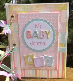 a baby's journal is sitting on a table