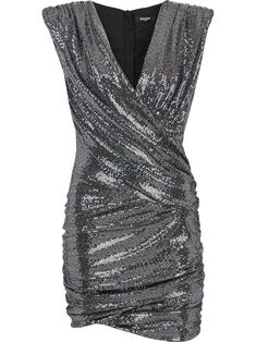 Silver wrap sleeveless mini dress from Balmain featuring V-neck, ruched detailing, asymmetric hem, rear zip fastening and sleeveless. | Balmain Wrap Sleeveless Mini Dress Georgina Sparks, Png Outfits, Sequin Short Dress, Edgy Glam, Balmain Clothing, Mid Skirt, Suits Clothing, Fame Dr, Sequin Shorts