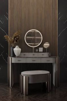 an elegant dressing table with a round mirror and stool in front of it, next to a marble paneled wall