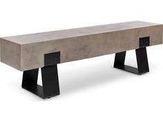 a bench made out of concrete with black legs