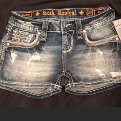 Rock Revival Shorts Bling Jean Shorts, Y2k Style Mid-rise Medium Wash Shorts, 2000s Shorts, Mcbling Shorts, Y2k High-rise Medium Wash Shorts, Y2k Mid-rise Denim Shorts, Rock Revival Shorts, Bling Jeans, Off The Shoulder Tee