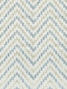 a blue and white zigzag pattern on fabric