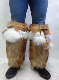 BRAND NEW FULL PELT TANUKI RACCOON FUR LEG WARMERS WITH WONDERFUL WHITE FOX FUR DESIGN FOR MEN AND WOMEN! PRODUCED WITH TOP QUALITY AND SELECTED REFURBISHED FUR PELTS. VERY ATTRACTIVE AND FASHIONABLE. IT HAS TIE STRINGS WITH FUR POMPOM ON UPPER PART AND ELASTIC AT THE BOTTOM. MEASUREMENTS:  *SIZE : ONE SIZE FITS ALL *LENGTH: 15" Oliverfurs 9250 Parc Ave. #204, Montreal, Quebec, H2N 1Z2, Canada www.oliverfurswholesale.com oliver@oliverfurswholesale.com Toll free: 1-866-845-9997 International: 1-514-845-9997 Fur Leg Warmers, Fur Design, Montreal Quebec, White Fox, Socks And Hosiery, Fox Fur, Leg Warmers, Hosiery, Montreal