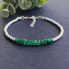 "* Beautiful Handmade Beaded Bracelet made with Genuine High quality Colombian Green Emerald ( natural green color) and 3mm Solid Sterling Silver Metal. * Colombian emerald has a pure and intense green. * Emeralds from Colombia possess less iron and fewer impurities and fractions than emeralds from other countries like Brazil and Zambia which makes Colombian emeralds much more valuable. Some of the most expensive and rarest emeralds in the world came the emerald mines in Colombia. * Emerald is a Handmade Round Beads Bracelets For Birthday, Bohemian Beaded Bracelets With Round Beads For Birthday, Handmade Round Bead Bracelets For Birthday, Bohemian Beaded Bracelets For Birthday, Gemstone Beads Rondelle Bracelet As Gift, Gemstone Beads Rondelle Bracelet For Gift, Rondelle Gemstone Beads Bracelet As Gift, Rondelle Gemstone Beads Bracelet For Gift, Faceted Beads Bracelets As May Birthstone Gift