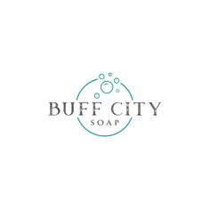 the logo for buff city soap, which has been designed to look like it is floating in