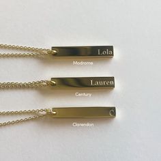 Not only is our Vertical Bar Necklace a timeless piece, but it’s also engravable! Make this chain and pendant necklace personal to you by engraving a special date, name, a sweet message, or anything else you want on it. This engravable necklace can fit up to 10 characters on one line, front and back. Classic Nameplate Necklace For Everyday, Classic Everyday Nameplate Necklace, Classic Nameplate Necklaces, Classic Engraved Necklace For Anniversary Gift, Minimalist Engraved Rectangular Necklace, Classic Engraved Nameplate Charm Necklaces, Classic Engraved Necklaces, Classic Personalized Necklaces For Anniversary Gift, Classic Personalized Necklace For Anniversary Gift