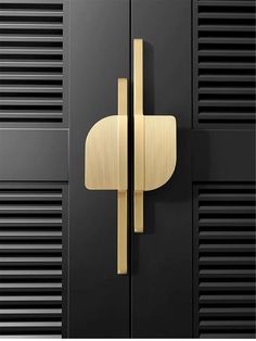 an image of a black and gold door