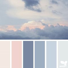 the sky is filled with clouds and some colors are blue, pink, grey, white