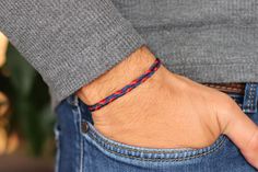 Braided mens nautical bracelet featuring fishtail woven strings in navy blue and red. The bracelet is adjustable to any size for perfect fit. Details: - Micro cord - Navy blue and red - Adjustable macrame closure For additional information, please feel free to contact us. Recovery Bracelet, Adjustable Friendship Bracelet, Sailor Bracelet, Matching Couple Bracelets, Bracelet String, Fishing Bracelet, Nautical Bracelet, Couples Bracelet, Couple Jewelry