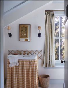 a bathroom with a sink and window in it