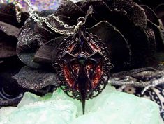 This vampire necklace contains a mix of dragon's blood resin and rose petals sealed under resin. Gothic Cross Necklace, Vampire Necklace, Gothic Pendant, Goth Necklace, Gothic Cross, Necklace Gothic, Gothic Crosses, Dragons Blood, Dracula