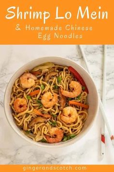 shrimp lo mein and egg noodles in a bowl with chopsticks on the side