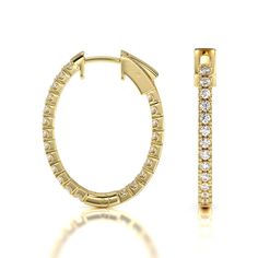 These oval shaped hoop earrings are crafted in 14k gold featuring a line of shimmering round cut brilliant diamonds. The inside out designs ensure that your exquisite diamonds can be admired from every angle. Shaped Hoop Earrings, Gorgeous Engagement Ring, Halo Engagement Ring, Brilliant Diamond, Oval Diamond, Conflict Free Diamonds, High Quality Jewelry, Diamond Gemstone, Diamond Studs