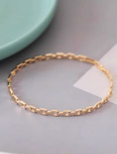 custom order 5-6 weeks  length 18.3cm  width 3.88mm  x 1.5mm  Material: 14 karat. Only solid gold. NO gold filled / NO gold plating   Gold Info:  24K gold is 100% pure 18K contains 75% gold and 25% alloyed metals 14K is 58.5% gold and 41.5% alloyed metals 9K contains 9 parts pure gold and 15 parts additional metals such as silver, tin, nickel, zinc, palladium, etc. ----------------------------------------------------------------------  quality, simplicity, reasonable price For questions or inquiry please do not hesitate to contact us. We will be happy to assist you.  SHIPPING: 1. Shipping takes approximately 3-5 business days (exclude weekend and holiday) for domestic customer.  Shipping via USPS five days a week Monday to Friday and comes with insurance.  You can track the parcel at USPS. Minimalist Chain Bracelet With Box Chain Bangle, Minimalist Bangle Chain Bracelet With Box Chain, Minimalist Gold Bangle Bracelet With Box Chain, Minimalist Gold Chain Bangle Bracelet, Minimalist Round Box Chain Bracelet, Minimalist Bangle Bracelet With Box Chain, 14k Gold-filled Link Bracelet With Delicate Chain, 14k Gold Chain Link Bracelet In Gold-tone, Tarnish Resistant Gold-tone Link Bracelets