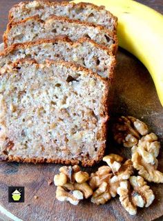 slices of banana bread with walnuts on a cutting board