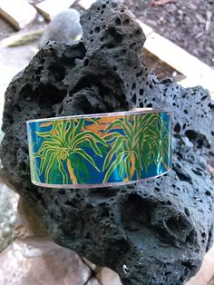 Palm tree Recycled cuff bracelets for men or women, Bangle bracelets for teenage girls or bracelets for grandmother This beautiful recycled Hawaii cuff bracelet is perfect for any age.Or occasion on 20 gauge aluminum metal it sturdy yet flexible enough to bend to your rest for the best comfortable fit it comes in 2 sizes on  6 inches long 1 1/2 inches wide.. large   6 inches long 1 inch widemedia     ( Note ) patterns may vary as each piece is hand cut. Smaller bracelets will lose peart of the i Can Earrings, Palm Cuff, Recycled Bracelets, Aluminum Bracelets, Aluminum Earrings, Cool Earrings, Aluminum Jewelry, Teenager Gifts, Kailua Kona