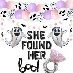 there are balloons that say she found her boo on the ground with ghost faces and stars